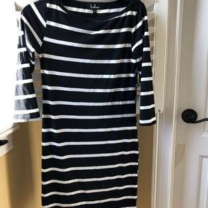 Knee length black and white striped dress